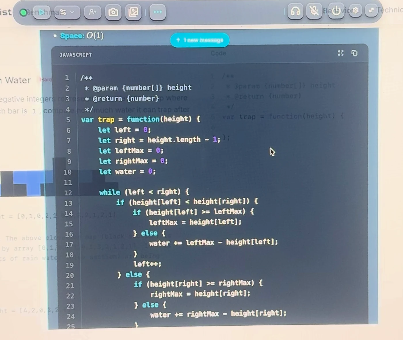 LockedIn AI coding answer with a JavaScript solution, and a 1 new message label over the top of the answer